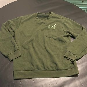 Green pocket crew neck